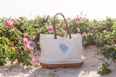 The tote of summer with a beautiful blue hydrangea on canvas and wicker bottom. Great for traveling or strolling around town 

#LTKTravel #LTKStyleTip #LTKFindsUnder50