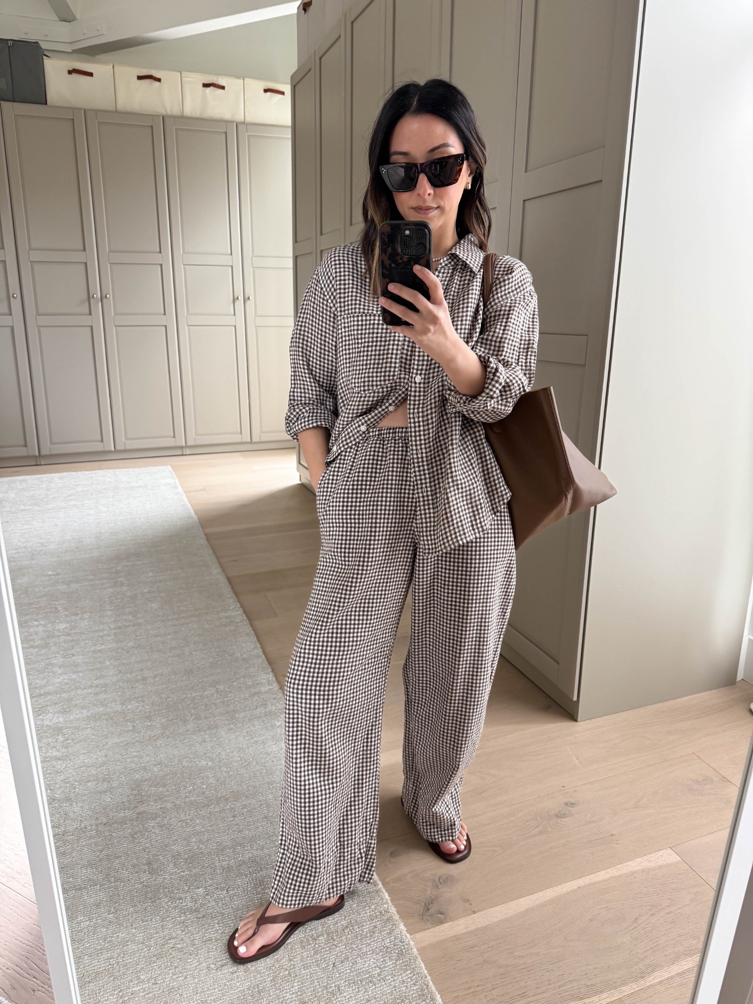 Linen gingham restocked! 

Petite-friendly linen gingham pants and button-down shirt. Gap offers petite pieces as we head into spring and summer. Just make sure you jump on these early because the small sizes will sell out. On sale!

Gap linen button-shirt petite small
Gap linen pants petite xs - after wash and dry, length is a little short. Could be worth trying the regular. 
Everlane sandals 5
Mansur Gavriel tote
Celine sunglasses
Quince earrings
Dorsey James necklace 15"

Spring style, spring outfits 2026, summer style, summer outfits, mom style, linen pants, spring break outfits