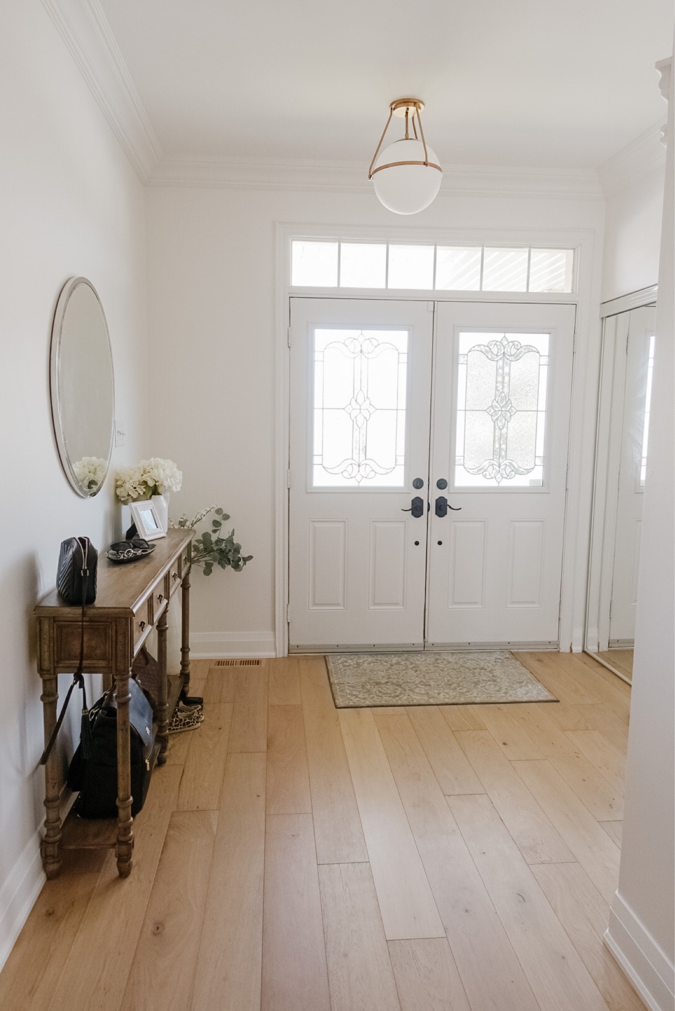 Love how the new light turned out in the entry! 

#LTKSale #LTKsalealert #LTKhome