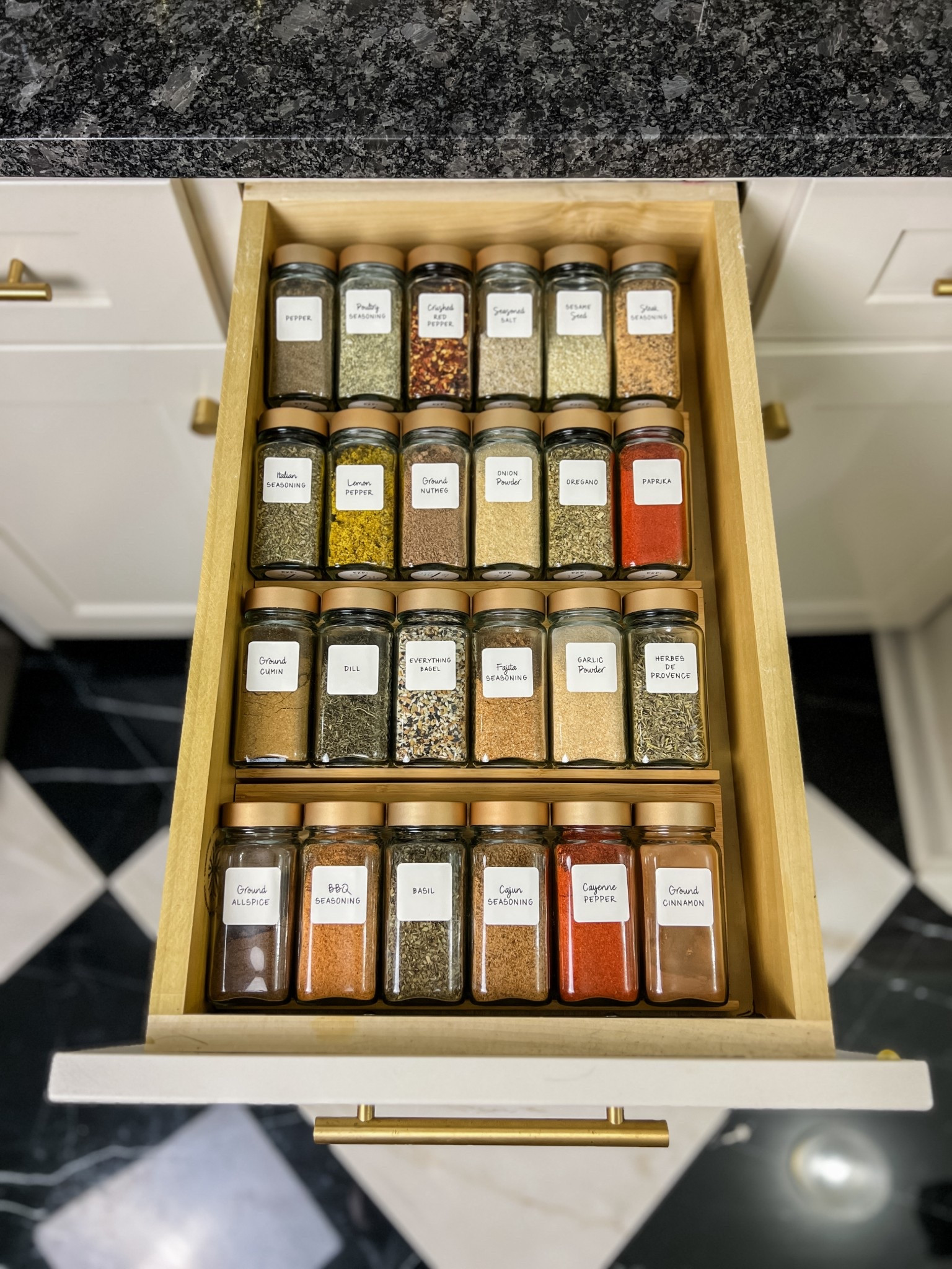 Nothing feels more fancy in a kitchen than a pretty organized spice drawer. Love these pre-printed labels too!

#LTKHome
