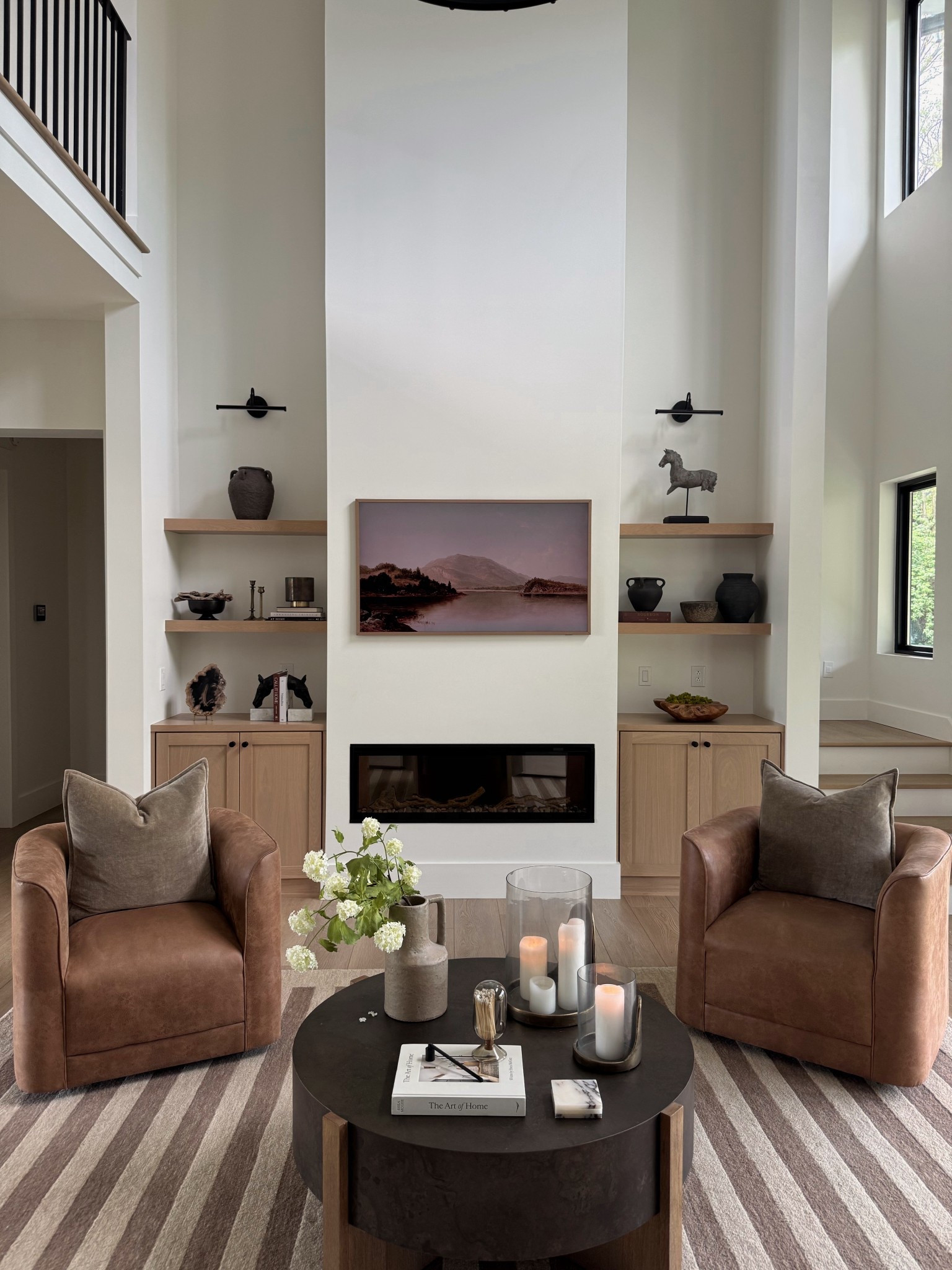 Simple spring living room styling 🤎 I keep almost all of my decor the same year round and just swap out a couple of pieces to bring a little more life for spring time 🌿

#LTKSeasonal #LTKSaleAlert #LTKHome
