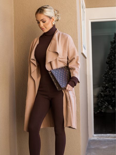 Neutral Outfit from Revolve! Follow @hollyjoannew for style and beauty!! Glad you’re here babe! Xx 

Helsa Brown Ribbed Turtleneck Bodysuit 
Helsa Tannis Stirrup Legging in Dark Brown 
SNDYS Tia Knit Cardi in Camel Cardigan Sweater
Heaven Mayhem Gold Plated Croissant Statement Earrings 
LV Clutch Wristlet

Elevated Casual Outfit | Workwear | Classy Elegant Style | Brown Tan Nude Tones | Brown Outfit | Skims Lookalike | Corporate Business Meeting Look | Family Event | Teacher Outfit 

#LTKfindsunder100 #LTKstyletip #LTKworkwear