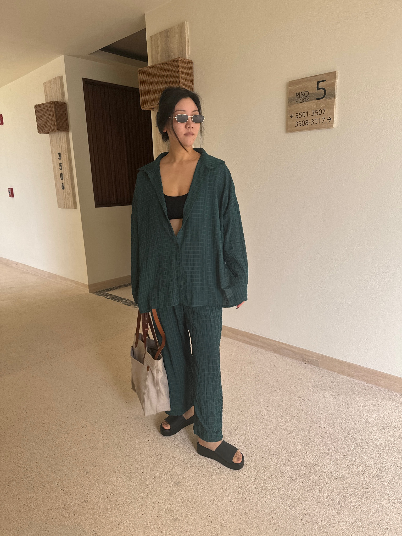 This green long-sleeved drop shoulder top and wide-leg pants set are so comfy and so chic! I love that it shows just the right amount of skin that makes it resort-appropriate! I linked my outfit and bag if you want to shop them!
#resortwear #loungewear #fashionfinds #comfyclothes

#LTKtravel #LTKstyletip #LTKSeasonal