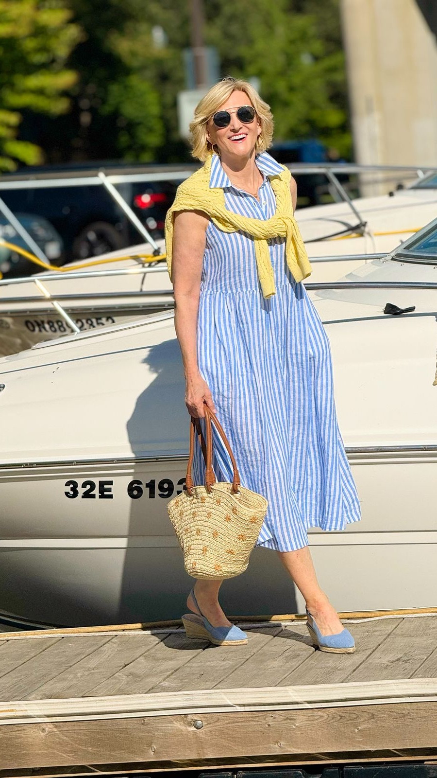 There’s something so effortlessly chic about linen in the summertime. 💙 I always find myself reaching for easy pieces like this blue striped linen dress—they’re comfortable, classic, and make getting dressed so simple.

I added a sunny yellow open-knit sweater over my shoulders for a little pop of colour (and because you never know when the evening breeze will roll in!), then finished the look with a straw tote and my favourite denim espadrilles. It’s one of those outfits that feels just as perfect for brunch as it does for a day of exploring.

Debs style tip: Instead of tying a lightweight sweater around your waist, try draping it over your shoulders. It instantly adds colour, texture, and a polished touch to even the simplest dress—plus, it’s practical when the temperature changes!

#LTKSeasonal #LTKOver40 #LTKootd