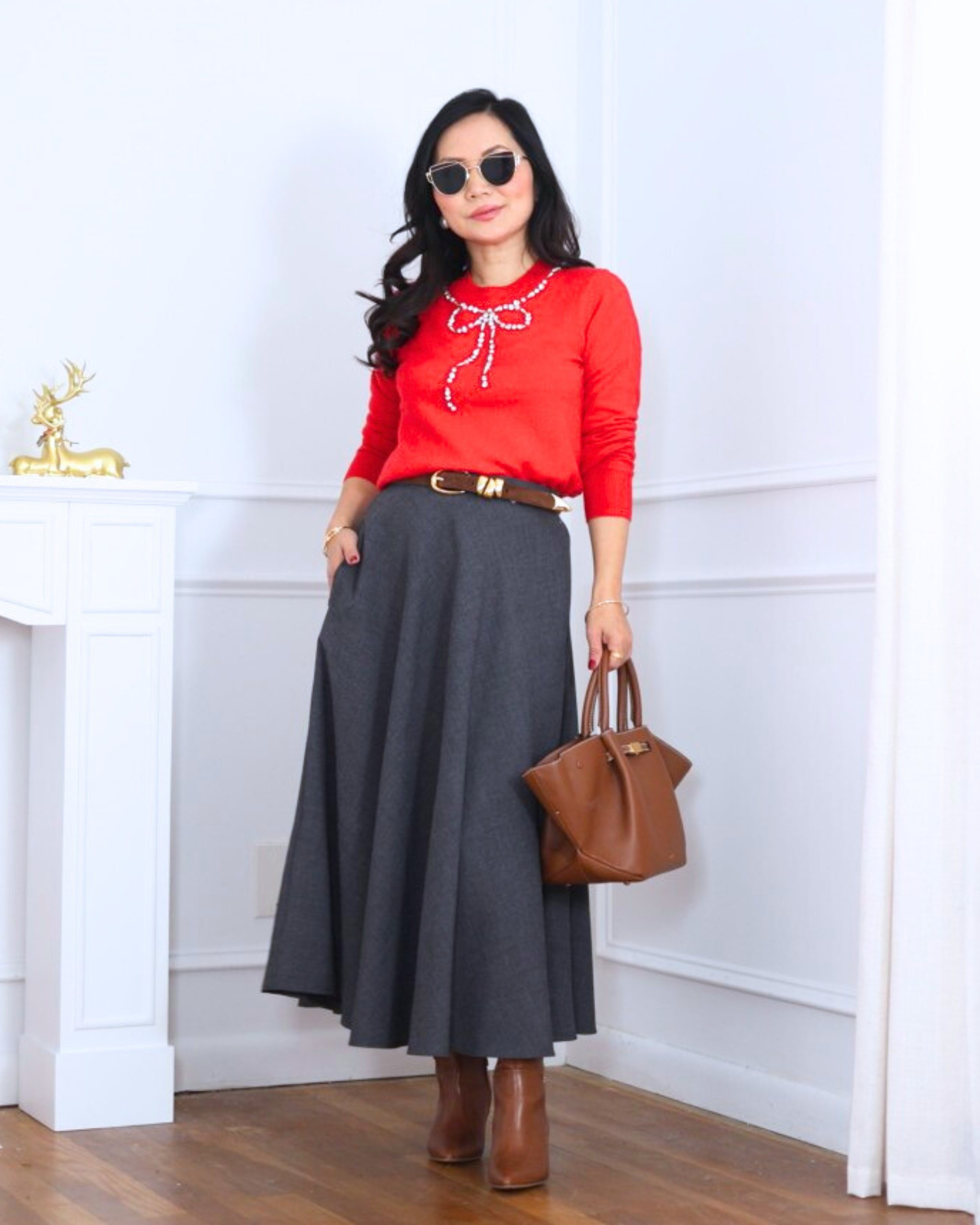 Feeling festive in this embellished bow sweater paired with an A-line skirt and tall boots—sweet, polished, and perfect for days when you want your outfit to do the smiling for you. I’m 5’2, wearing size XS. 

#LTKOver40 #LTKPetite #LTKHoliday