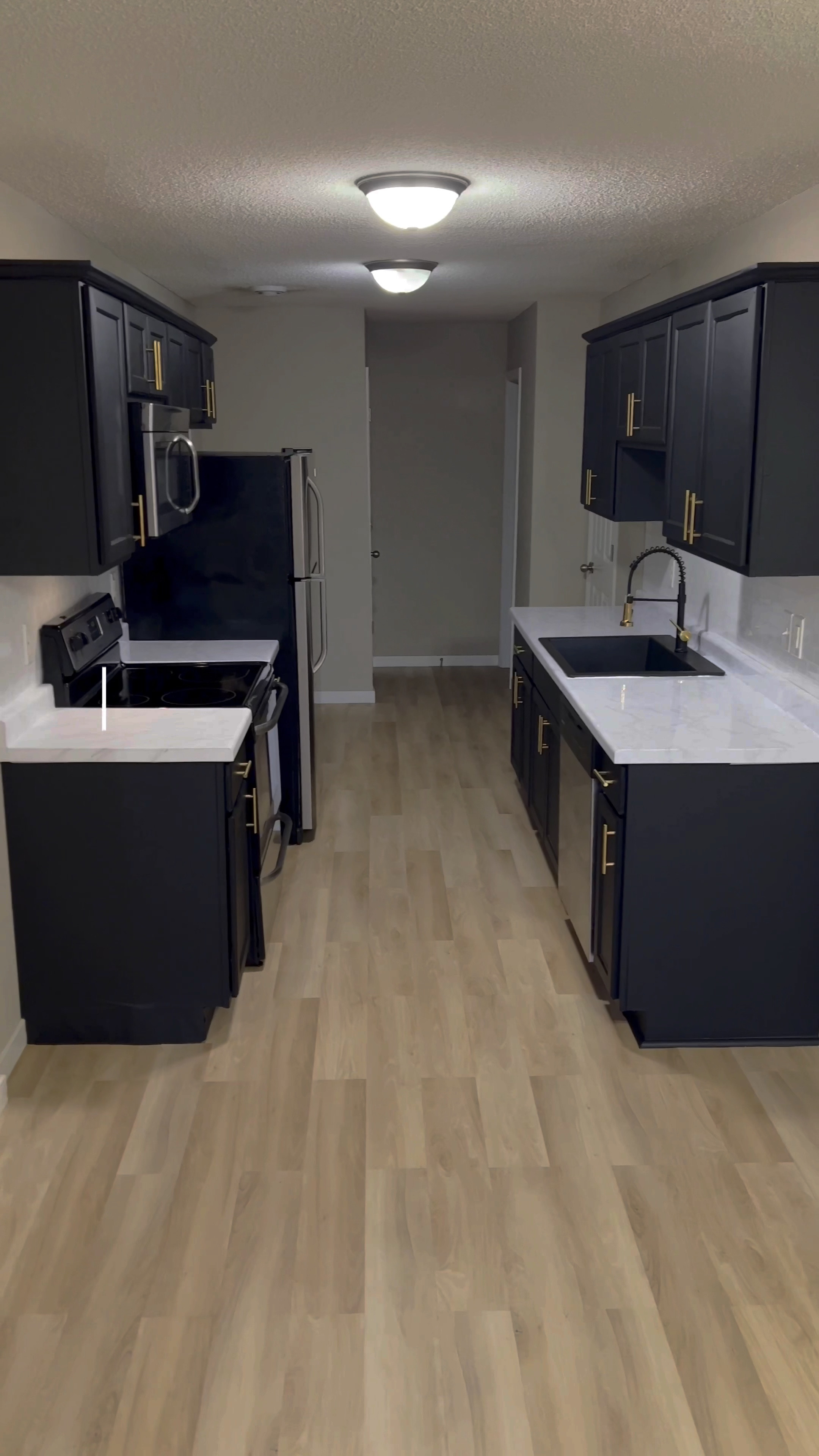 Part 2! Y’all I highly suggest getting the cutting tools and knee pads (my floor cutter came with them!) made such a difference and the cleaner cuts with laying. The flooring by @lucida_surfaces and backsplash by @art3d_llc 🫶🏾 
**Make sure to use painters tape on the walls! The backsplash is STRONG and will rip walls without the painters tape so don’t want that heat ache if you’re renting !

.
.
.
.
.
#home #diy #peelandstick #countertops #peelandstickcountertops #shanicelashaystyle #lucidasurfaces #art3d #amazonfinds #amazonhome #modernkitchen #rentalfriendly #kitchenrenovation #kitchenremodel #rentalkitchen #interiordesign 

#LTKhome #LTKstyletip #LTKfindsunder100