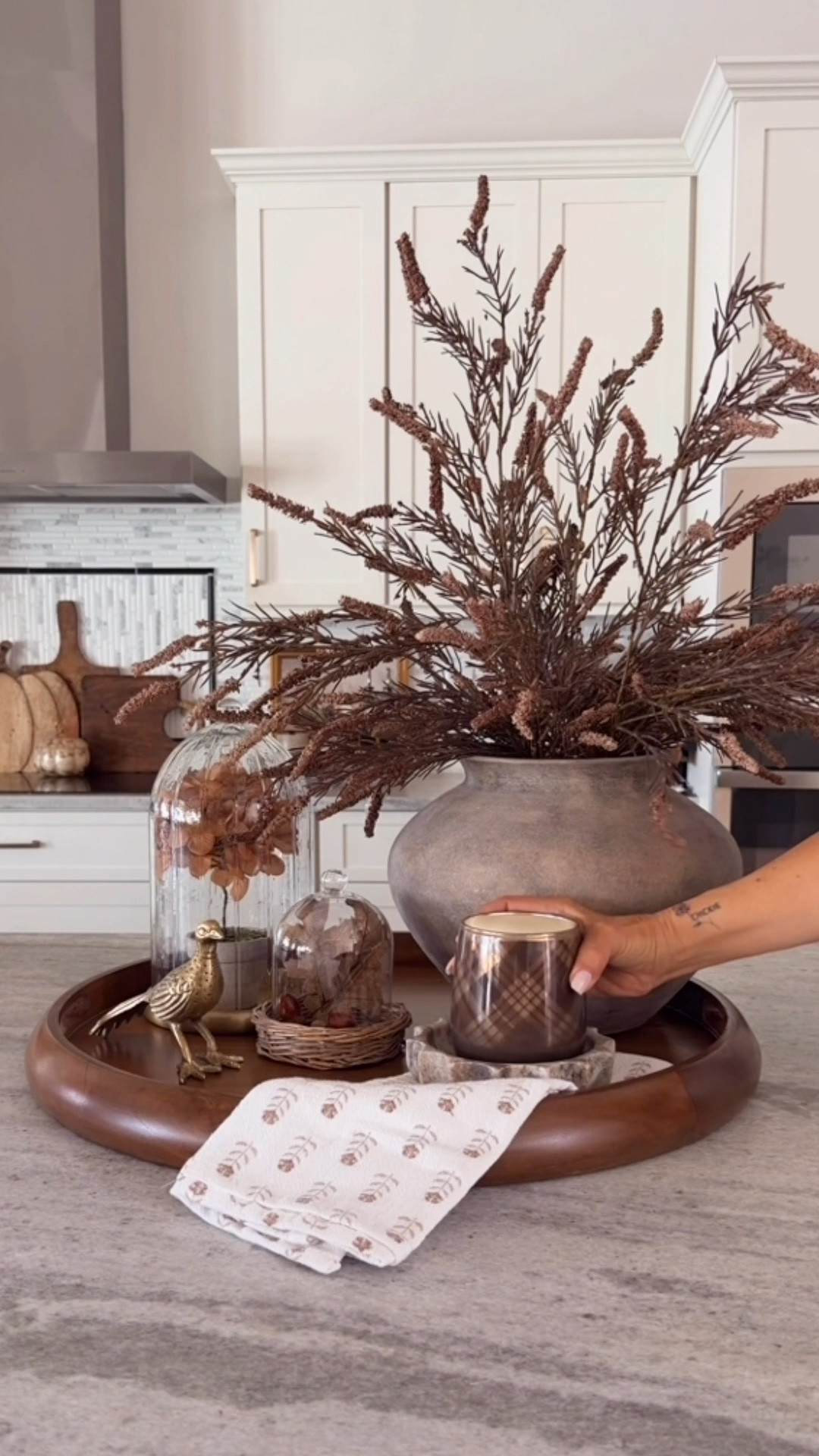 Fall Vinyette
Wood tray, fall stems, large cloche, wicker bottom cloche, gold bird, candle, vase, transitional home, modern decor, amazon find, amazon home, target home decor, mcgee and co, studio mcgee, amazon must have, pottery. barn, Walmart finds, affordable decor, home styling, budget friendly, accessories, neutral decor, home finds, buy new arrival, coming soon, sale alert, high end look for less, Amazon favorites, Target finds, cozy, modern, earthy, transitional, luxe, romantic, home decor, budget friendly decor #amazonhome

#LTKSeasonal #LTKHome