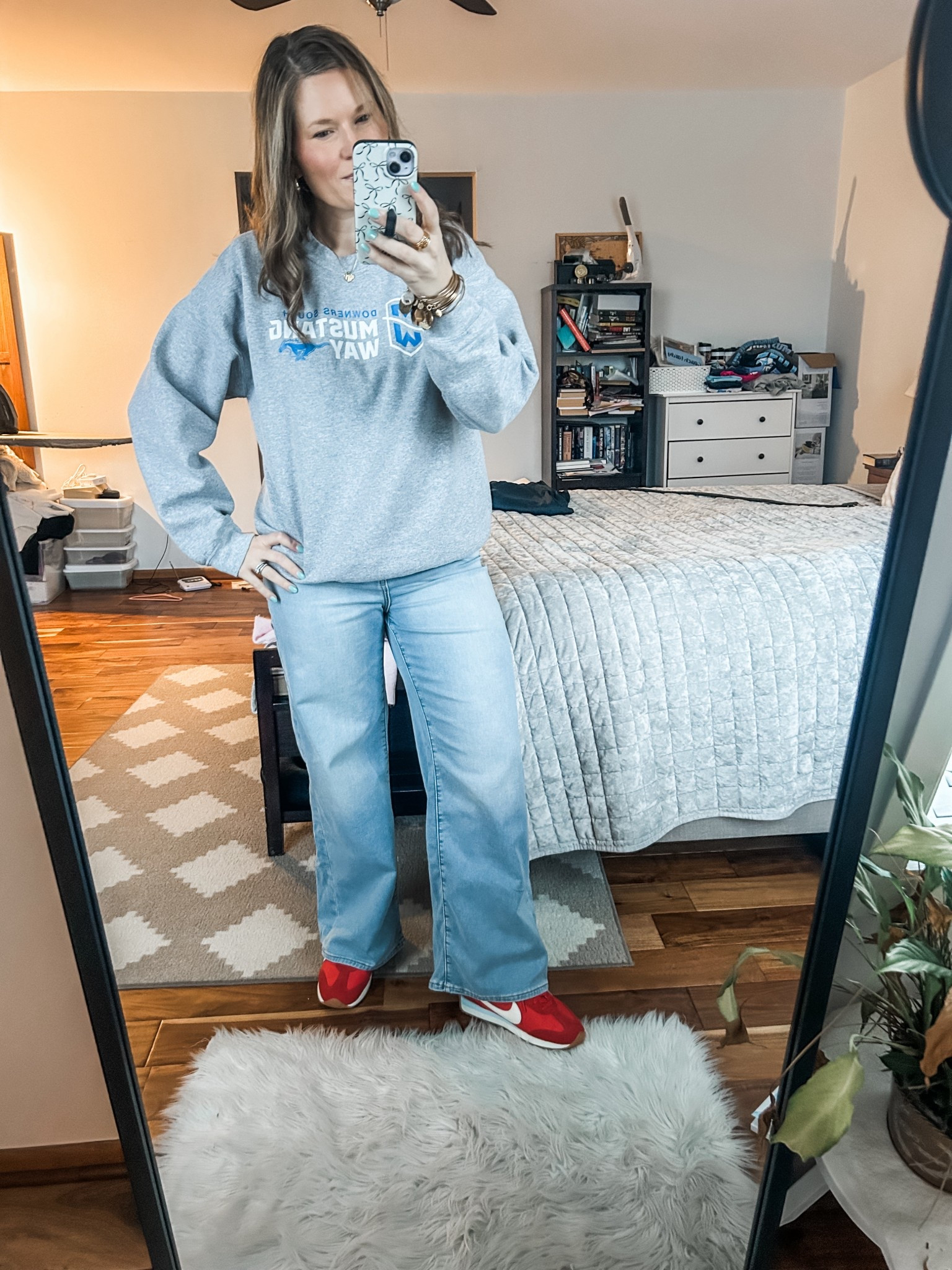 Had to wear this sweatshirt today but was excited to try out the viral sweatpant jeans! They are super comfy and lightweight! Also love this pop-of-color sneaker ❤️

#LTKootd #LTKOver40 #LTKMidsize
