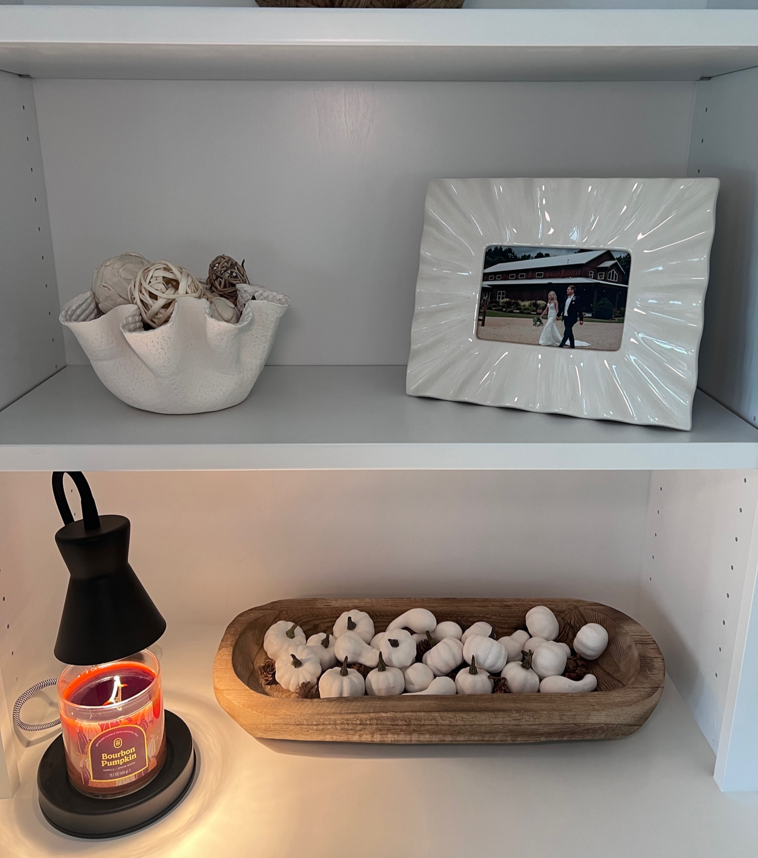 My favorite frame with the best smelling candle🤍🎃

#LTKSeasonal #LTKHome #LTKFindsUnder50