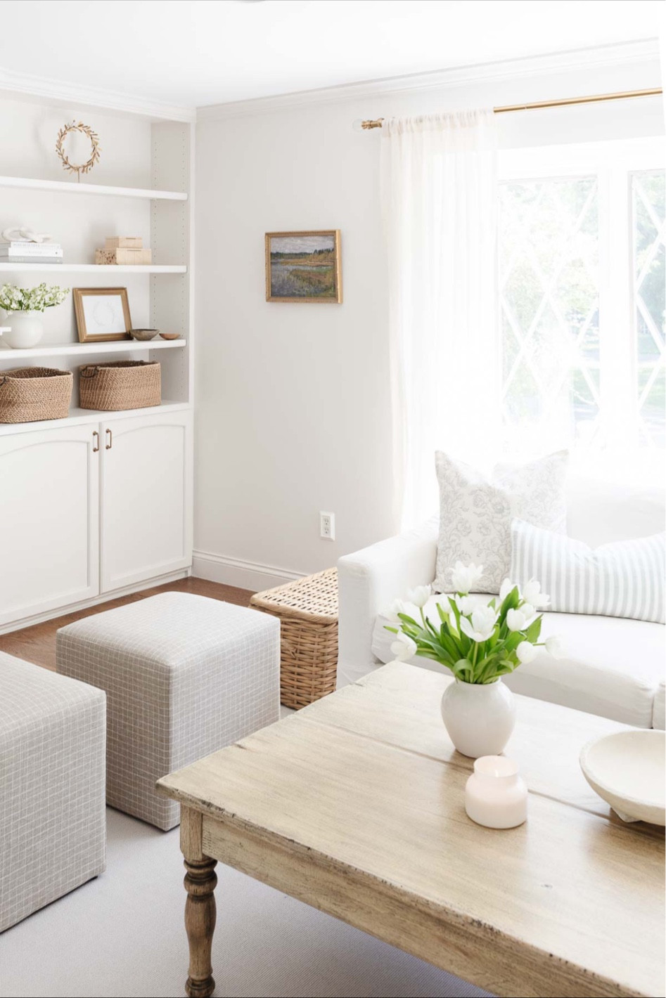 Living room fall decor with Monika Hibbs Home pillow covers, McGee & Co metal boxes, Pottery Barn storage baskets, wall art, and more! Living room inspiration, living room decor, livinr room cozy, white warm living room.

#LTKhome #LTKstyletip #LTKSeasonal