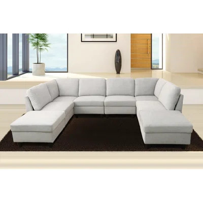 Airica 118" Wide Symmetrical Modular Sectional with Ottoman | Wayfair North America