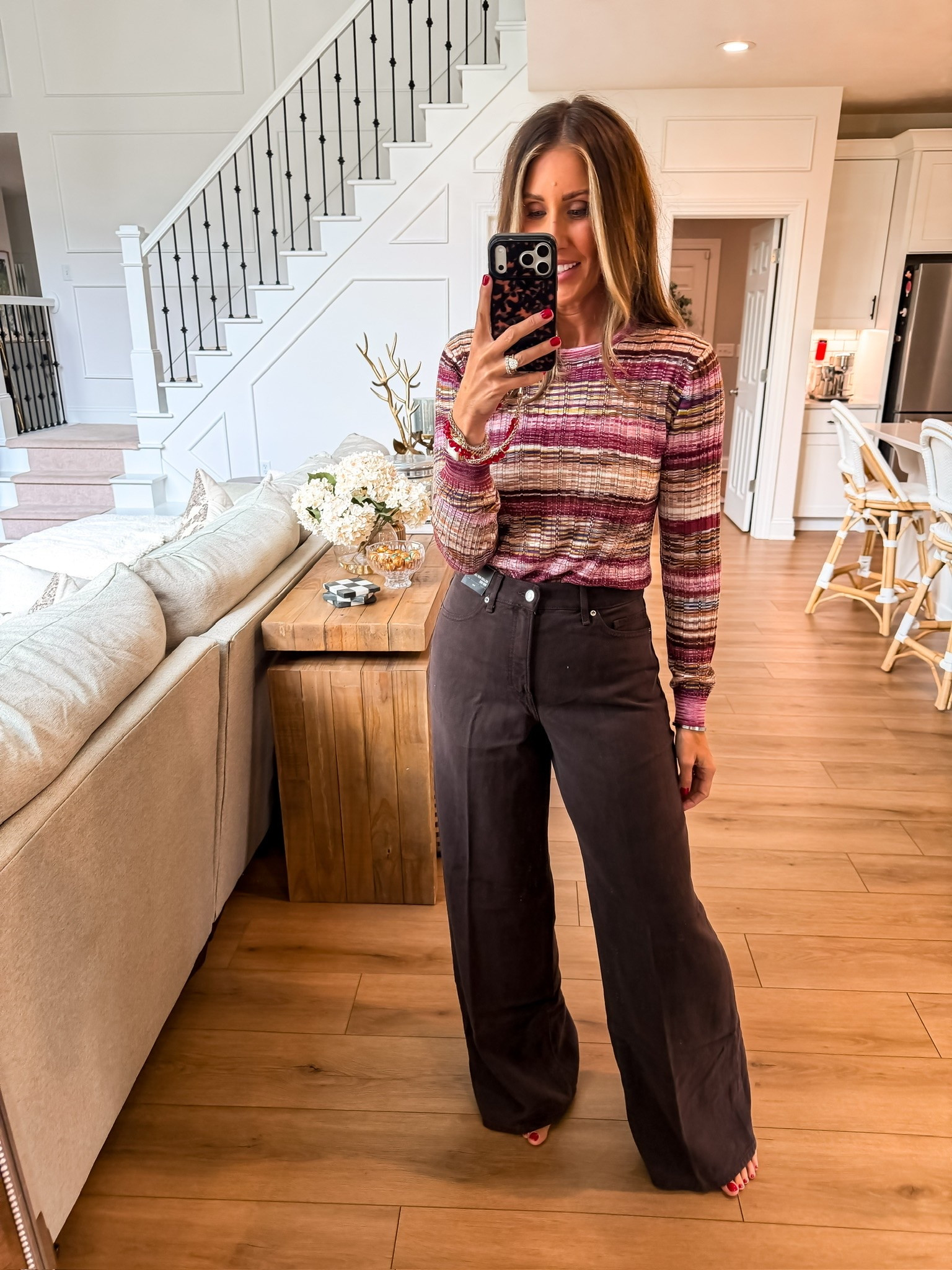 This striped sweater is such a good way to bring fall color into the mix without going full sweater weather yet. I love the berry, brown, and cream tones paired with chocolate wide leg pants for an easy outfit that feels seasonal but still wearable now.

striped sweater, chocolate brown pants, early fall outfit, fall color palette, wide leg pants, transitional outfit, casual fall style, themominstyle

#LTKootd #LTKgrwm #LTKdayinmylife