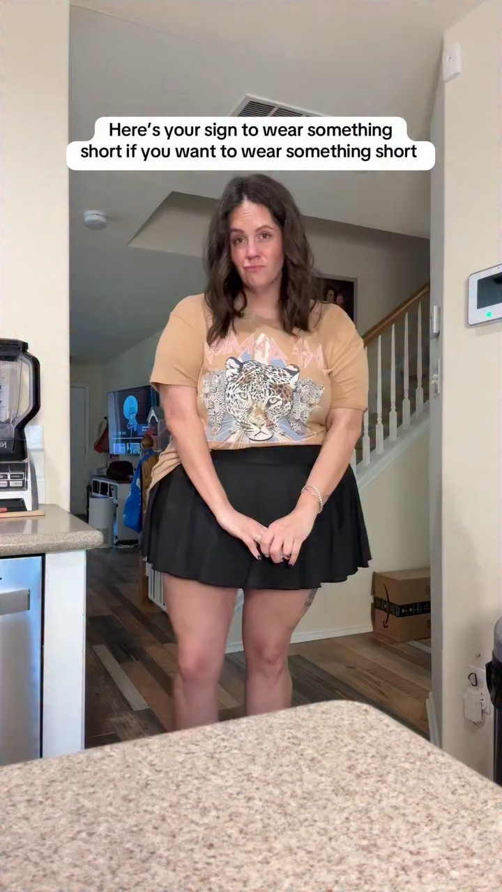 One day I’m in sweats and the next day I’m in shorts. Here’s my winter plus size winter OOTD....Texas edition. This top is from @walmartfashion, I check every season for new graphics by Time and Tru. They're so affordable and easy to style. The skort is from @amazonfashion and I think it's my new favorite. I've been looking for a short athletic skort that is actually short and this one is perfect! #plussizeootd #ootd #walmartfinds #amazonfinds #plussize #aponbelly