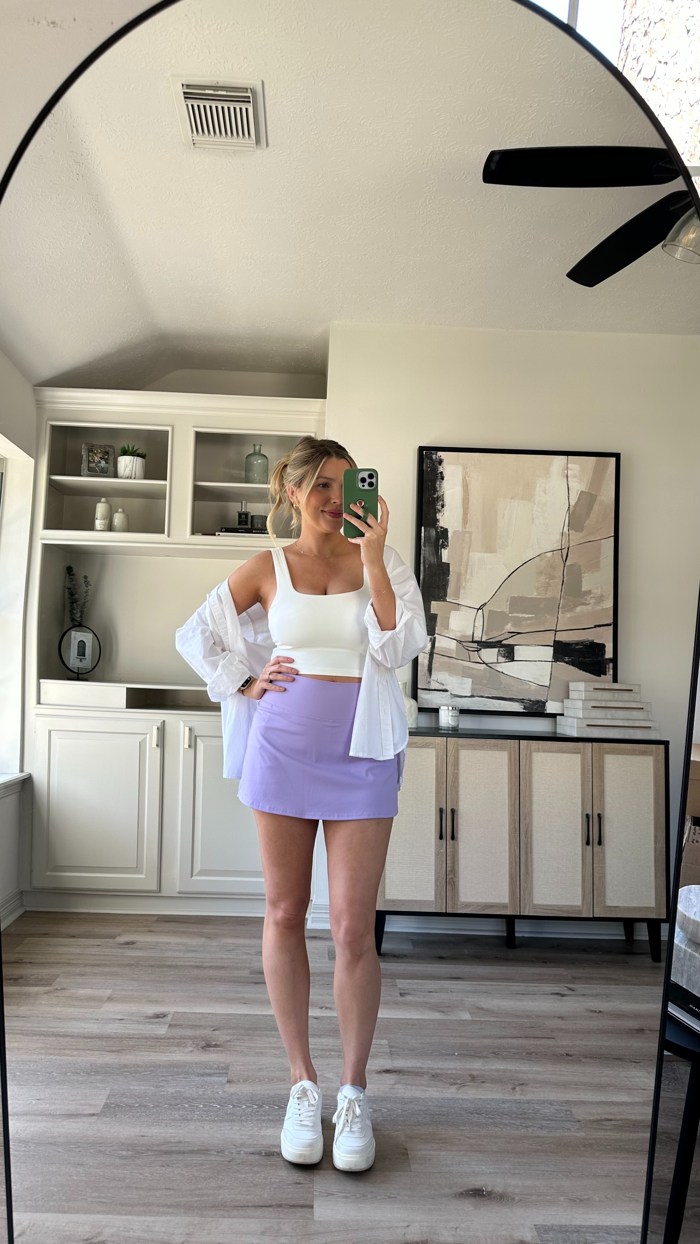 Casual Spring Outfit | Love this athletic skort, so comfortable and I love the built in shorts. Wearing size M in the skort, workout tank, and white button up. Shoes fit tts. 

 

#LTKStyleTip