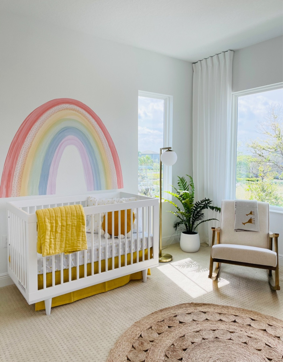 Rainbow Baby Nursery with accent chair and modern lighting 

#LTKhome #LTKCyberWeek #LTKkids