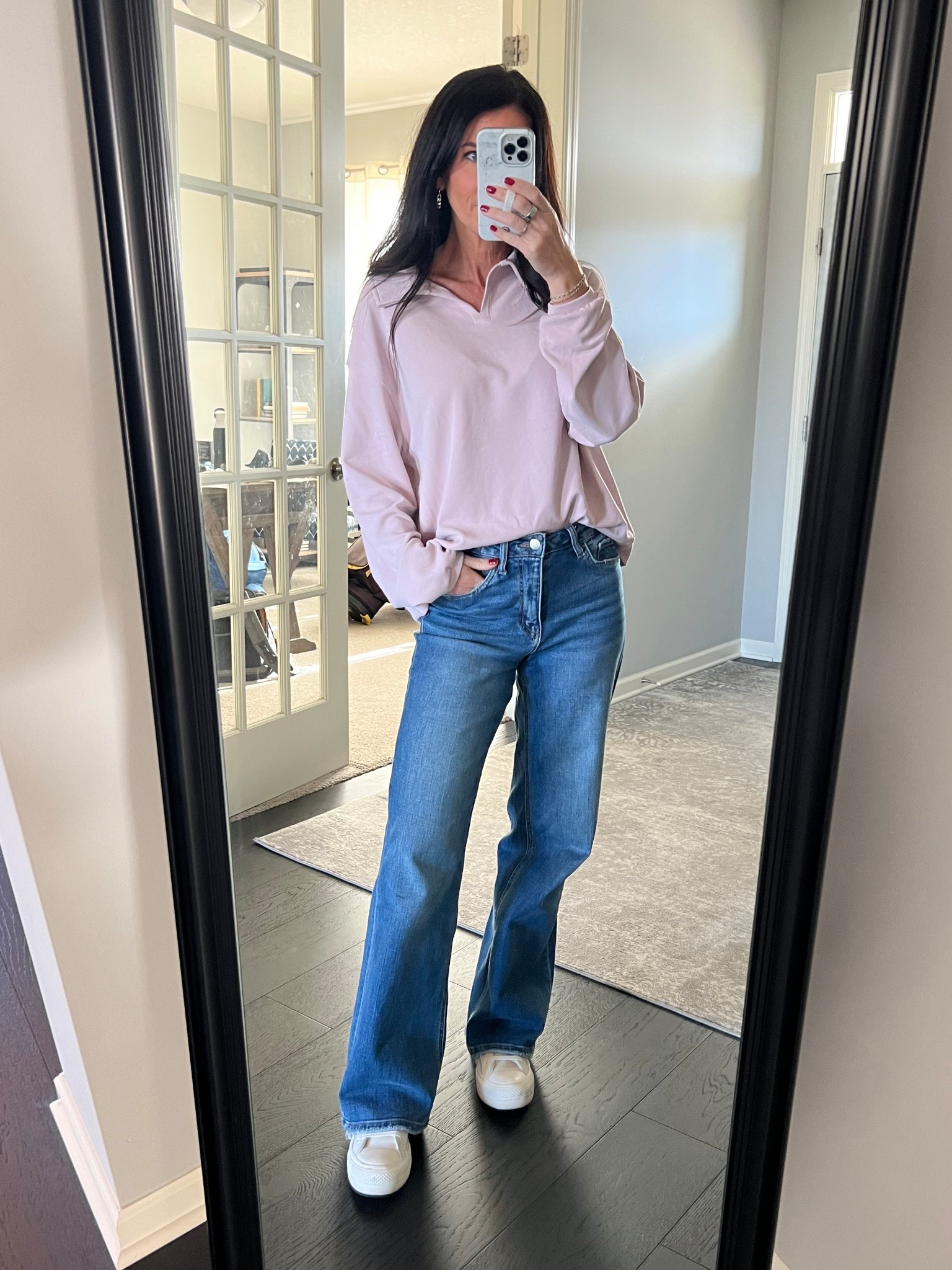 This polo shirt is so warm and comfy! Oversized fit, I’m wearing XS. It’s on sale right now and comes in multiple colors. Love it with a wide leg jean and high top converse shoes  

#LTKOver40 #LTKSaleAlert #LTKGiftGuide