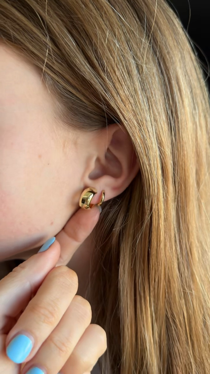 The prettiest gold earrings! Comes in a set on Amazon and we all love them.