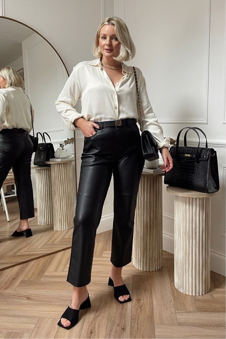Styling leather trousers - chic look perfect for date night! Satin cream shirt, black heeled mules & quilted handbag  

#LTKstyletip #LTKshoecrush #LTKitbag
