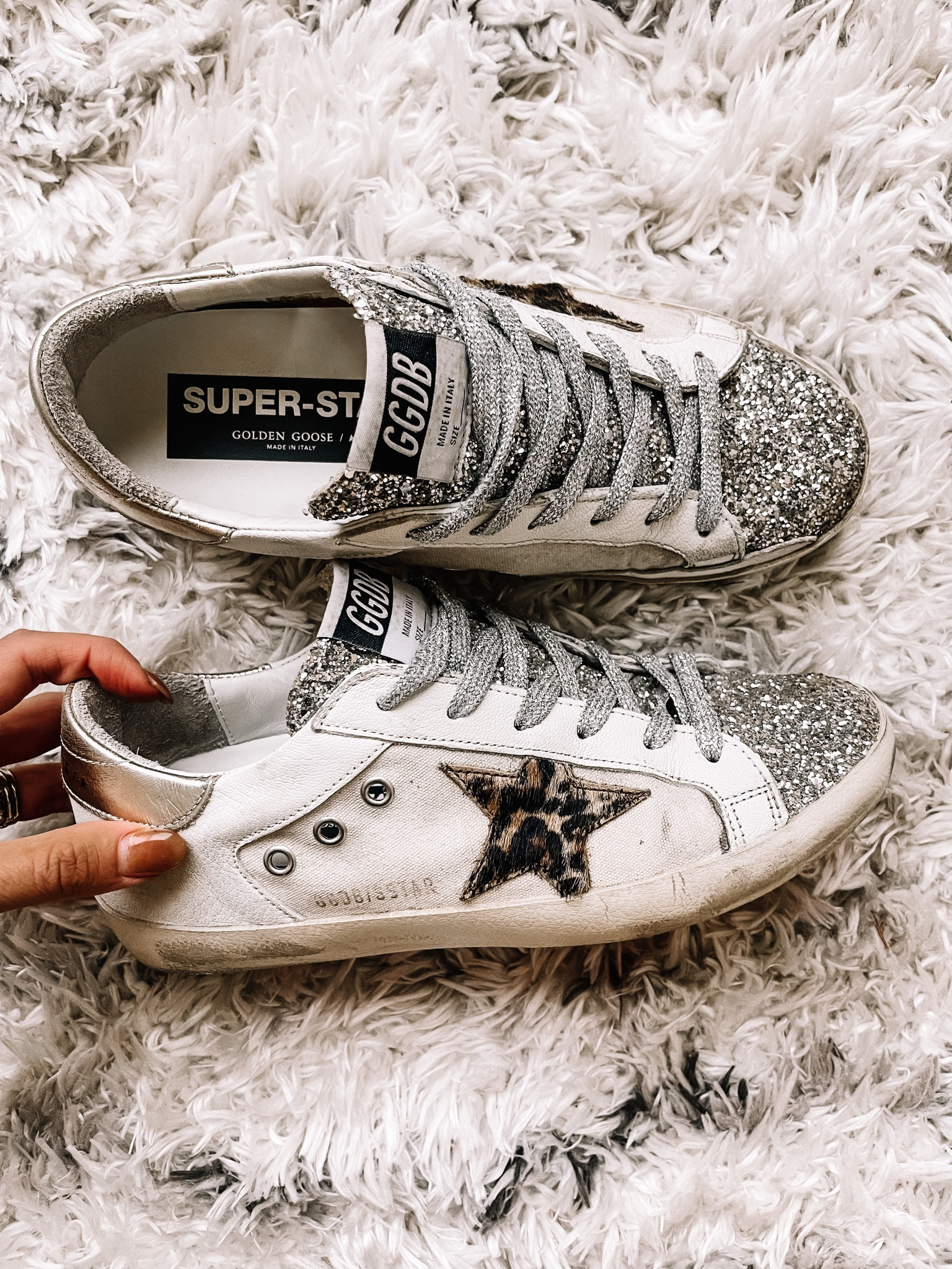 My golden goose sneakers with glitter and leopard star, hot pink bottoms and metallic laces! I wear size EU38

#LTKshoecrush #LTKsalealert #LTKstyletip