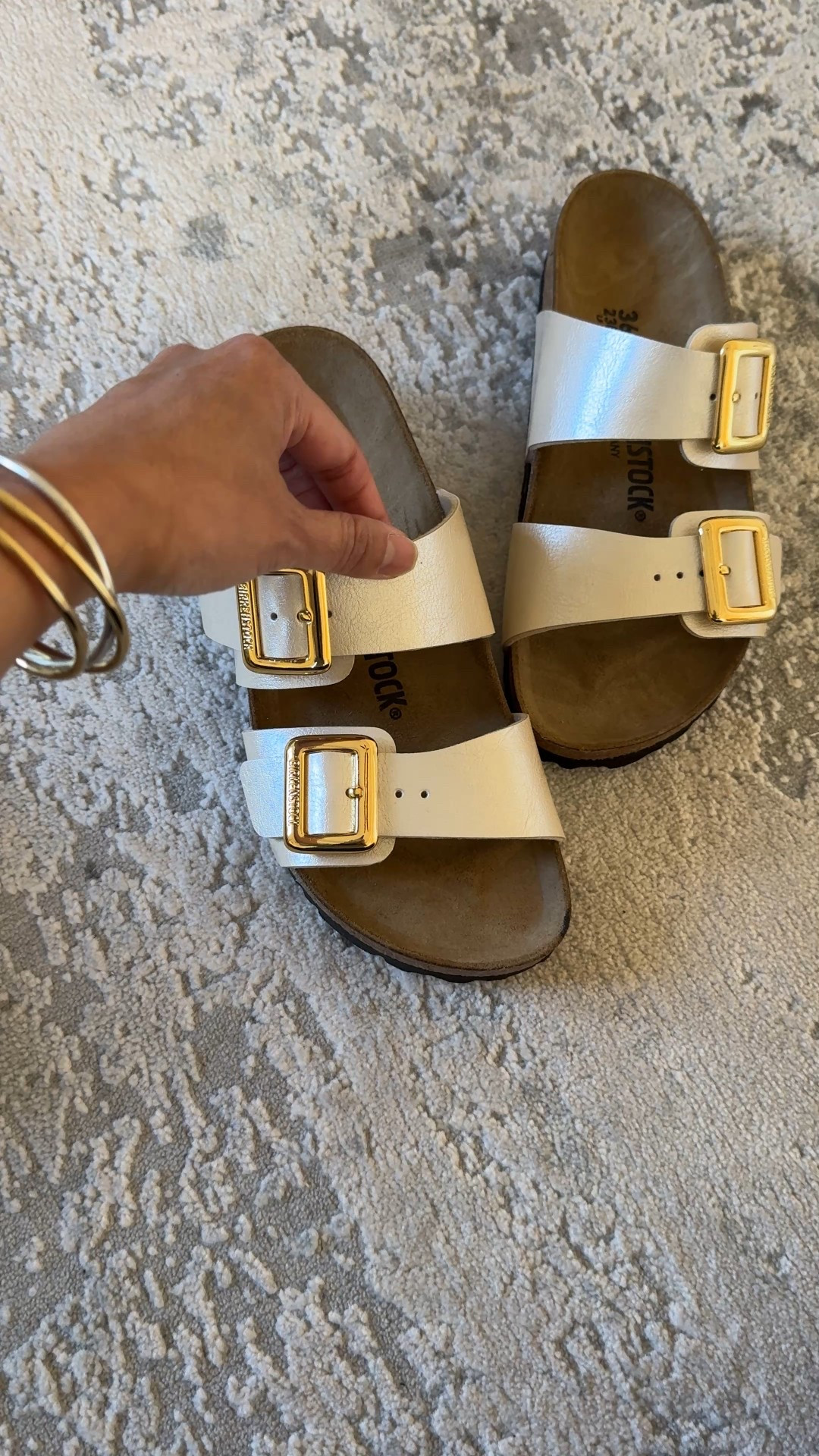 Sandals. Slide sandals. Travel. 
Wore these new Birkenstock sandals over vacation on spring break and now wearing them for summer outfits. 
I take the narrow width true to size. 

Linen shorts are a nice athleisure style. I size down in these shorts. 

Bangle bracelets go with everything. Water durable  

#LTKTravel #LTKOver40 #LTKShoeCrush