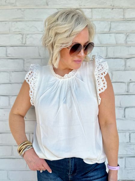 White top is perfect for layering. 
Runs tts, wearing a large 

Use code WANDA10


#LTKunder100 #LTKFind #LTKGiftGuide