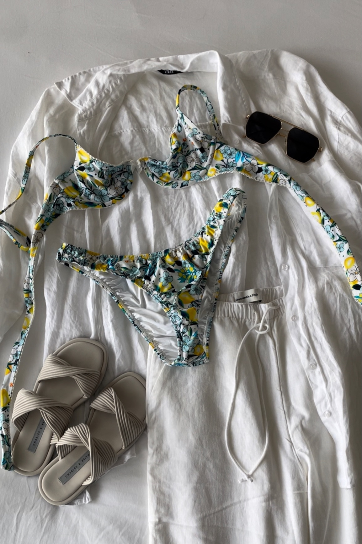 Vacation outfit #vacationoutfit #vacation #swim #swimsuit #bathingsuit #linenpants #linenshirt #linen #sunglasses #amazon #abercrombie 

#LTKunder100 #LTKFind #LTKSeasonal