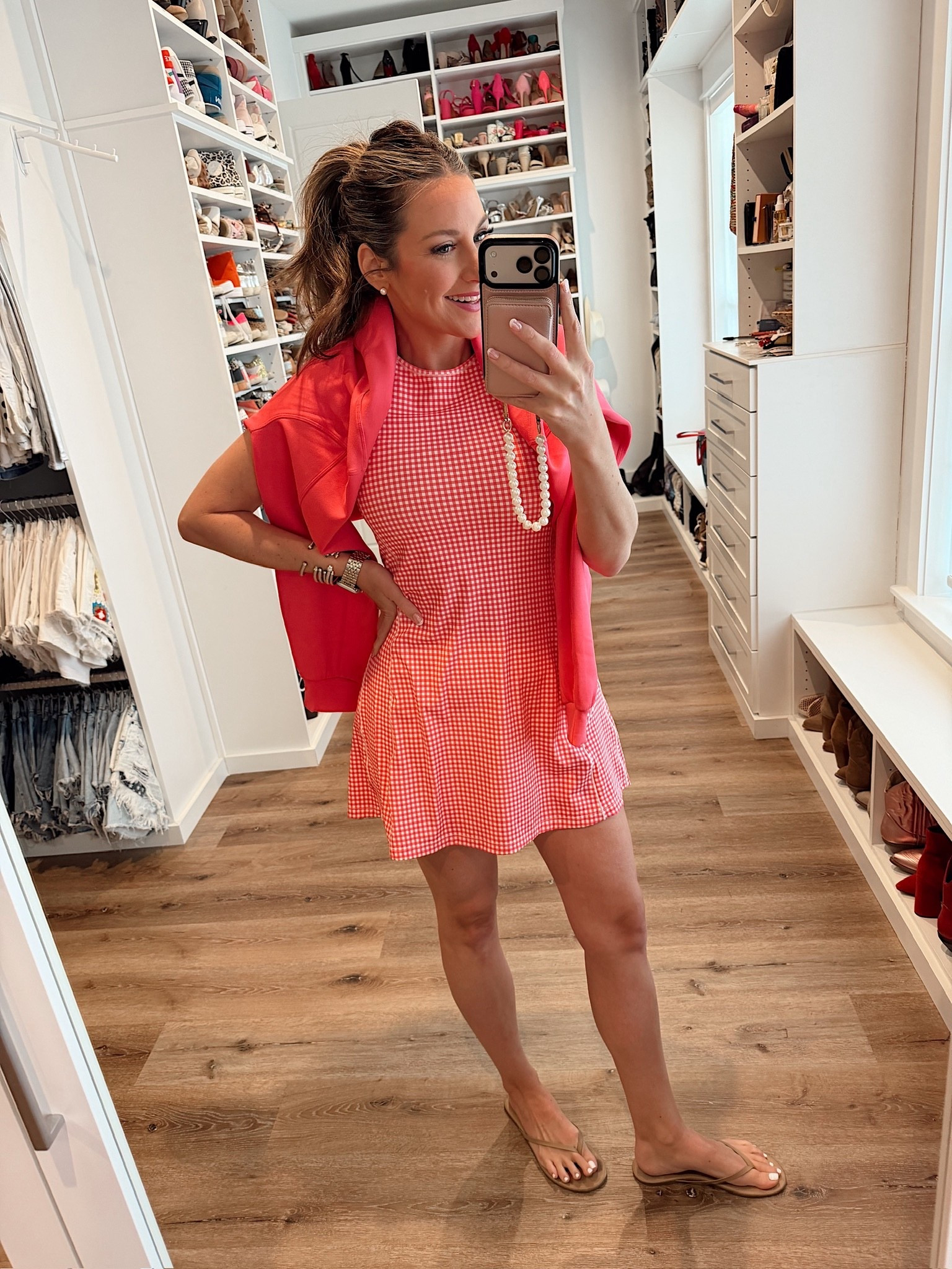 In a medium guava gingham active dress, large sweatshirt, sandals and accessories - fits tts.

#LTKootd #LTKmomlife #LTKSeasonal