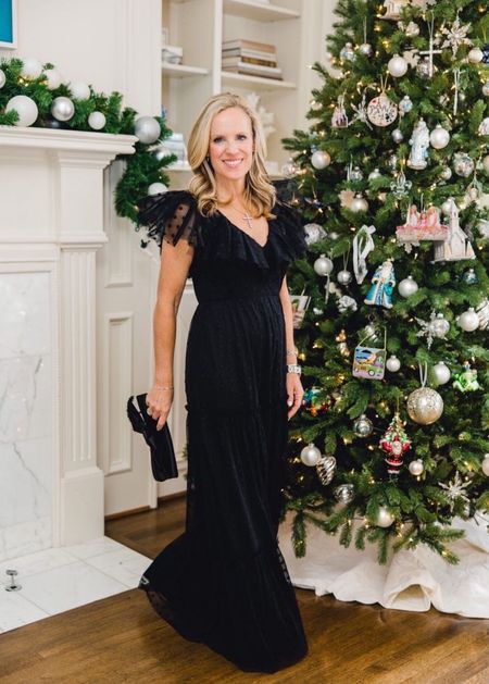 Holiday parties are starting and I am excited to wear this gorgeous tulle gown.   Not only are the delicate embroidered flowers on top of the fabric so beautiful, the ruffle sleeves and flattering fit make for a very romantic design.

Holiday dress
tulle dress
black maxi dress for evening event


#LTKover40 #LTKstyletip #LTKHoliday