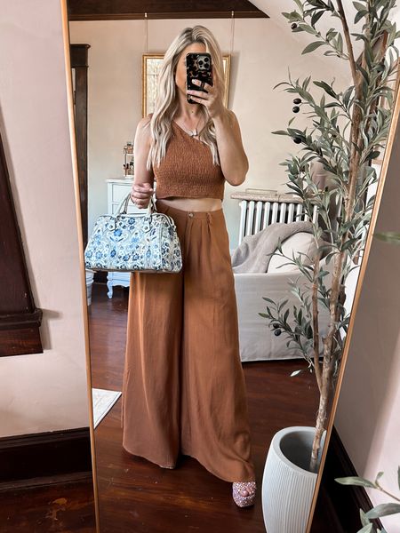 Rust colored set, wearing size M. Top is slightly loose fyi, but pants fit well
Linen wide leg pants 


#LTKFind #LTKstyletip