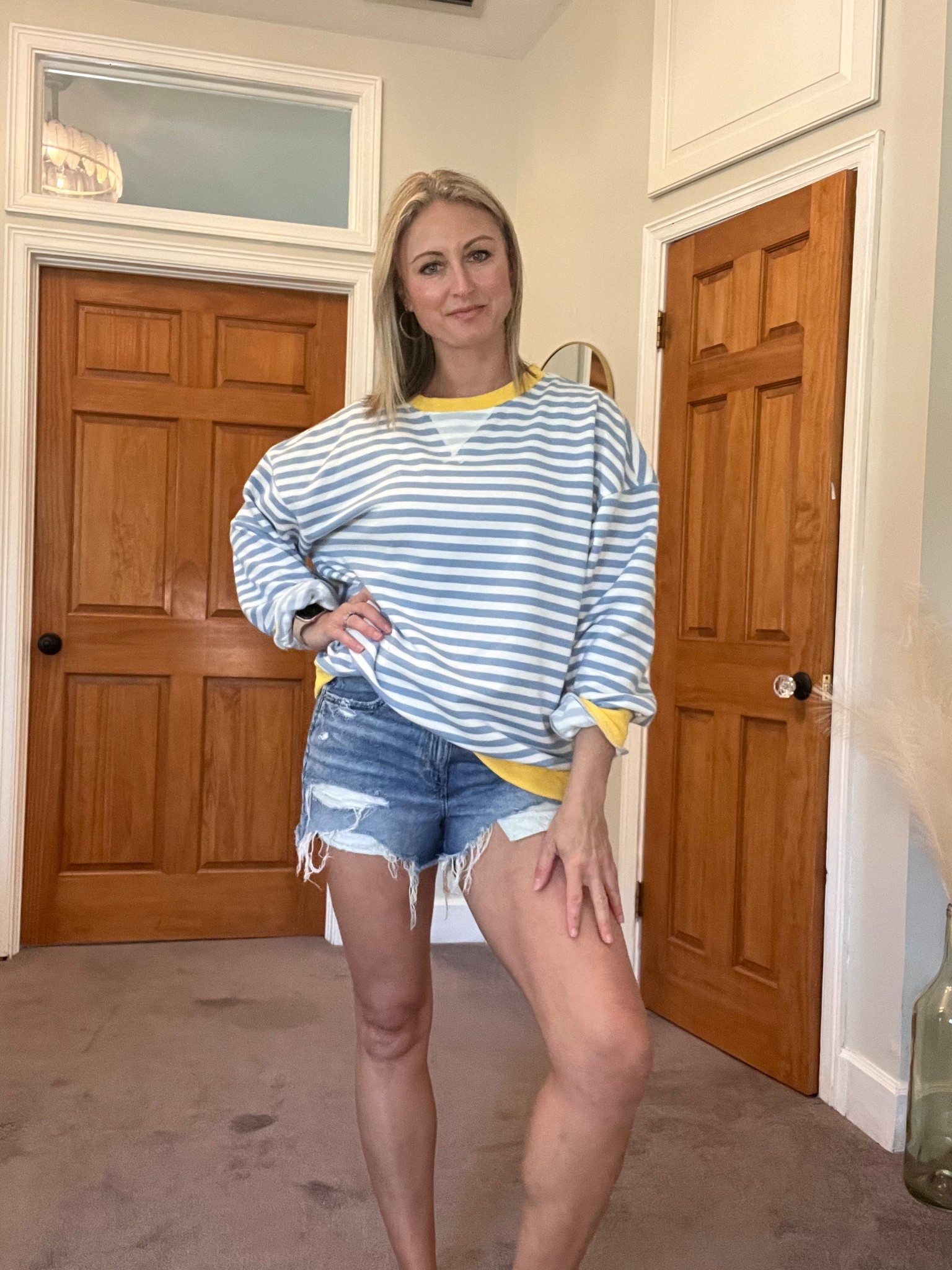 I love a comfy sweatshirt with cute denim shorts. These AE denim shorts are my fave, I buy them every time I need a new pair. This is my most worn sweatshirt I’ve posted several times in my other color combo- for this one I got a size L to have it just a little more oversized. Shorts are a size 6. 

#LTKootd #LTKOver40