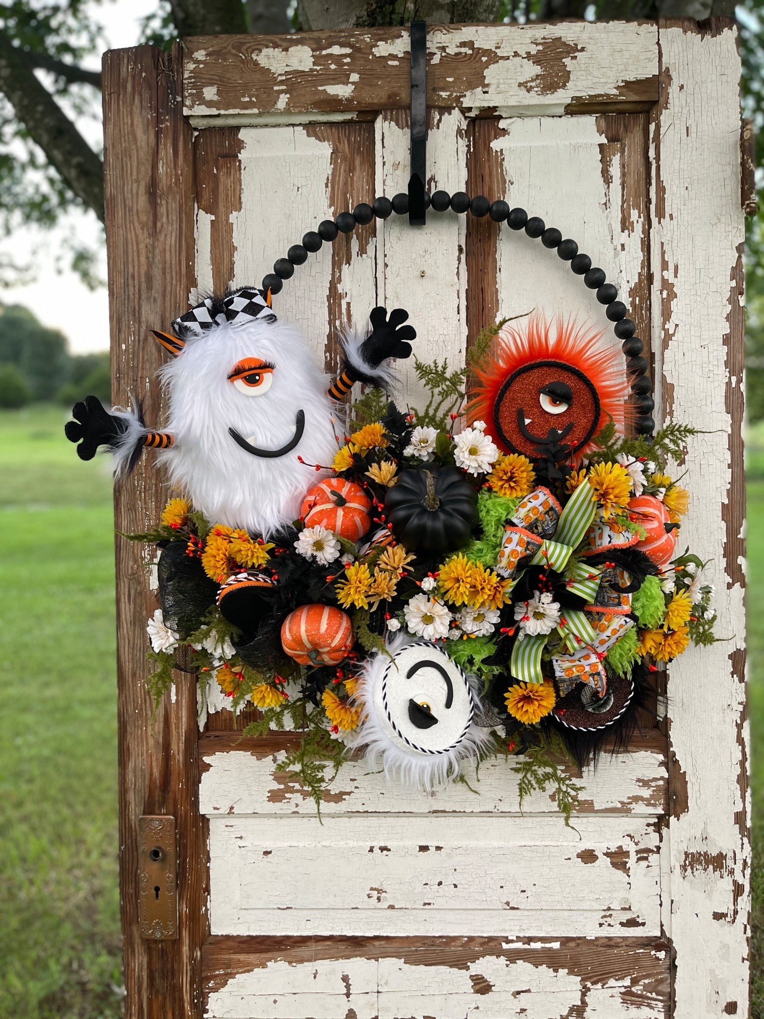 Meet your new favorite Halloween porch greeters! 👀🎃
Packed with bright blooms, pumpkins, and the cutest little monsters, this one-of-a-kind wreath is ready to make your door the star of spooky season. 🖤🧡💚



#LTKautumn #LTKHome #LTKSeasonal
