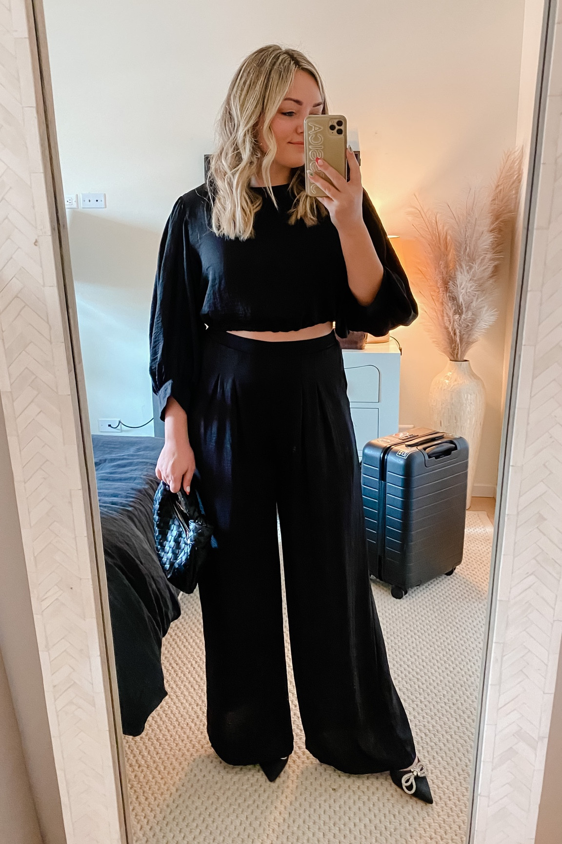 The cutest going out set for $89! Comfortable, flattering, and the top is adjustable. Waistband on the pants is stretchy in the back and forgivable! True to size — I’m in a Medium. Great for holiday parties! 
These sparkly bow heels are also true to size… Low heel and pretty comfy to stand in! Under $50, along with my bag.

#LTKHoliday #LTKunder50 #LTKunder100