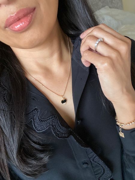 Valentine’s Day. Date night. Jewelry gifts. Heart charm necklace. Tennis bracelet. Code HINTOFGLAM to save. 
Blouse is a beautiful style. True to size for me; size up if in between or longer arms. Lip combo is a favorite lipstick and lip gloss  

#LTKGiftGuide #LTKover40 #LTKfindsunder100