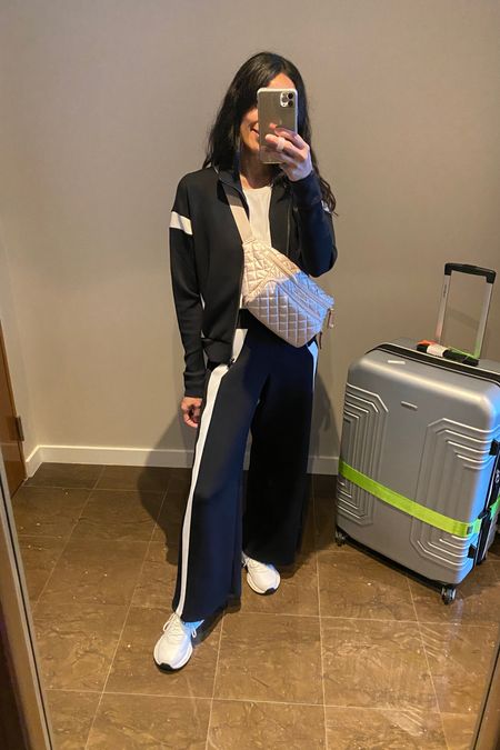 Travel outfit. Airplane outfit. Airport outfit. Track jacket true to size. Track wide leg pants true to size or size down. In Petite at 5’4. Code NAOMIXSPANX to save. 
Travel essentials. Luggage. Suitcase. Luggage strap. Luggage tag. Amazon  

#LTKover40 #LTKtravel #LTKstyletip