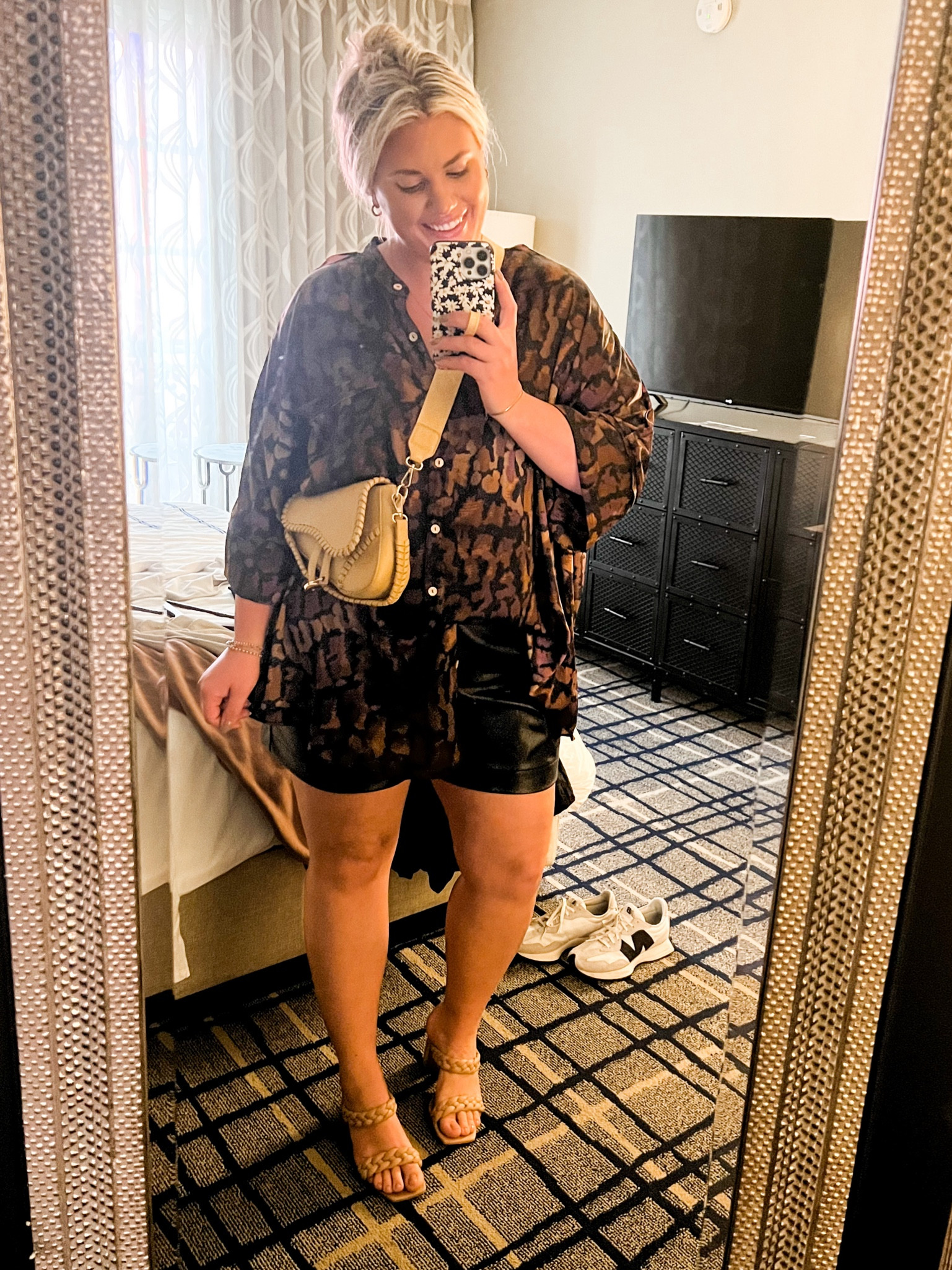 This silk top is so fun! Comes in other prints! I’m in a large. Faux leather shorts are so good! I sized up to an xl. 

#LTKstyletip #LTKunder50 #LTKSeasonal