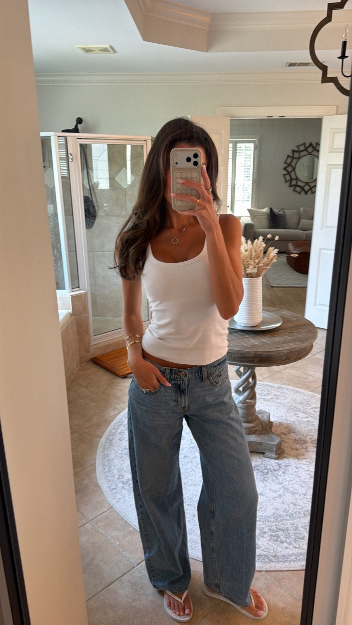 OOTD! Size 26 long jeans and small tank. I love this tank has a built-in bra. ￼

#LTKSaleAlert #LTKootd