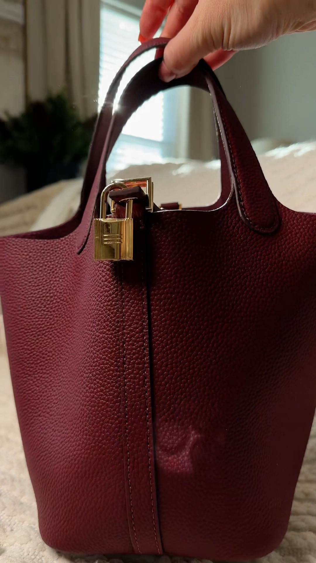 The designer version of this genuine leather bucket bag goes for around $4,000 and I literally cannot wrap my mind around paying that much for a purse!!
This lookalike is match for match, but a fraction of the price! #bucketbag #bucketpurse #handbag 

#LTKItBag