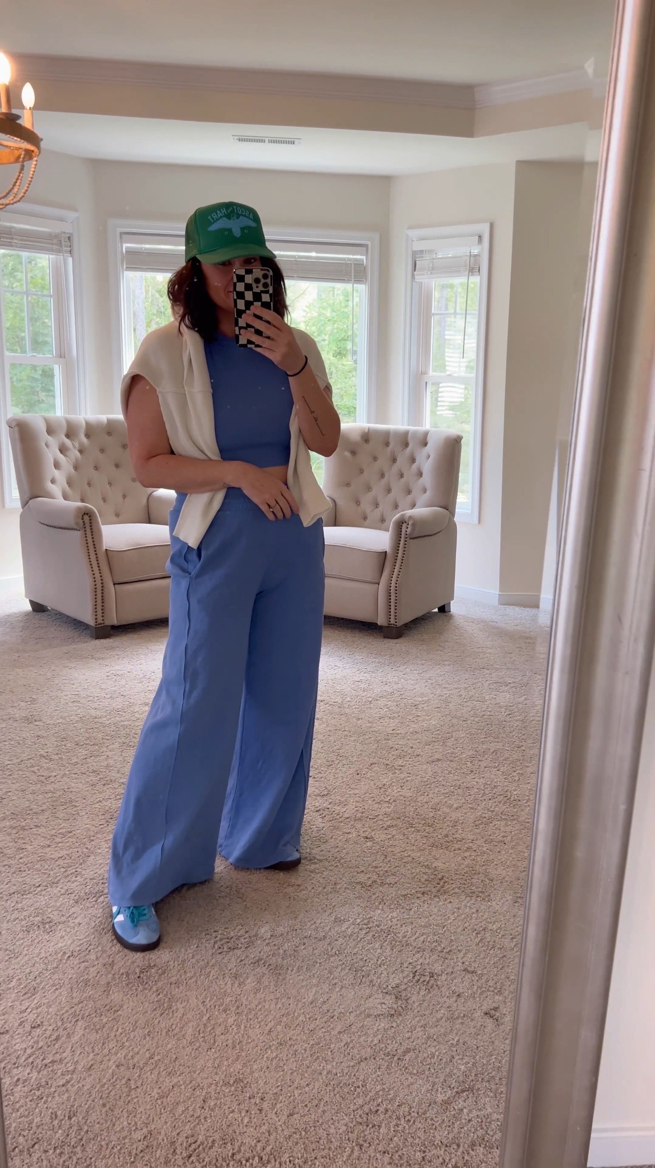 Feelin’ blue, but in the best way 💙 Layered up in the ‘Go-To Set’ from @freepeople, topped with my favorite trucker hat and sweater for a cozy vibe. #FreePeopleStyle #CasualChic  

#LTKMidsize #LTKStyleTip