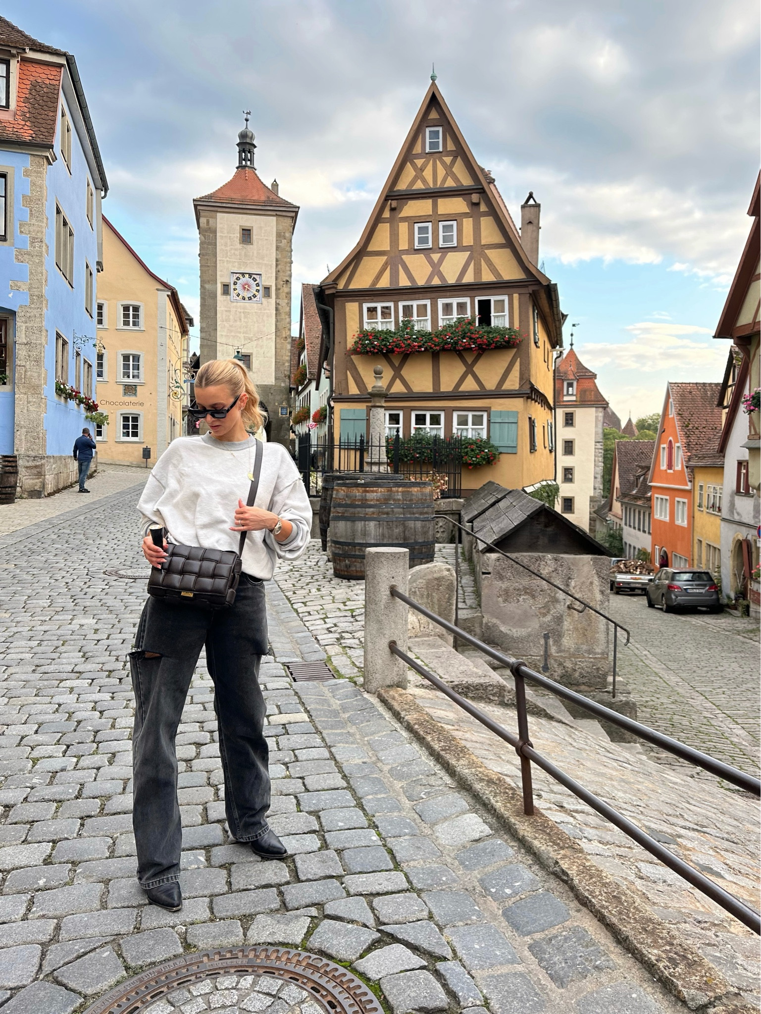 Strolling through Rothenburg, Germany, in my favorite jeans, inside-out hoodie, cowboy boots, and Bottega in hand. Cozy, casual, always! 🤎🍂

#LTKTravel #LTKSeasonal #LTKStyleTip