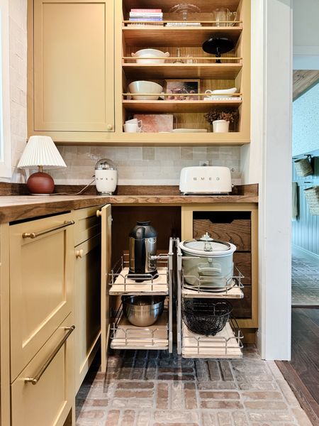 You’ve gotta see this practical use of corner space in our pantry! A pull-out shelf for your blind corner cabinets is the way to go. Utilize all that otherwise lost space way in the back. 

#LTKhome
