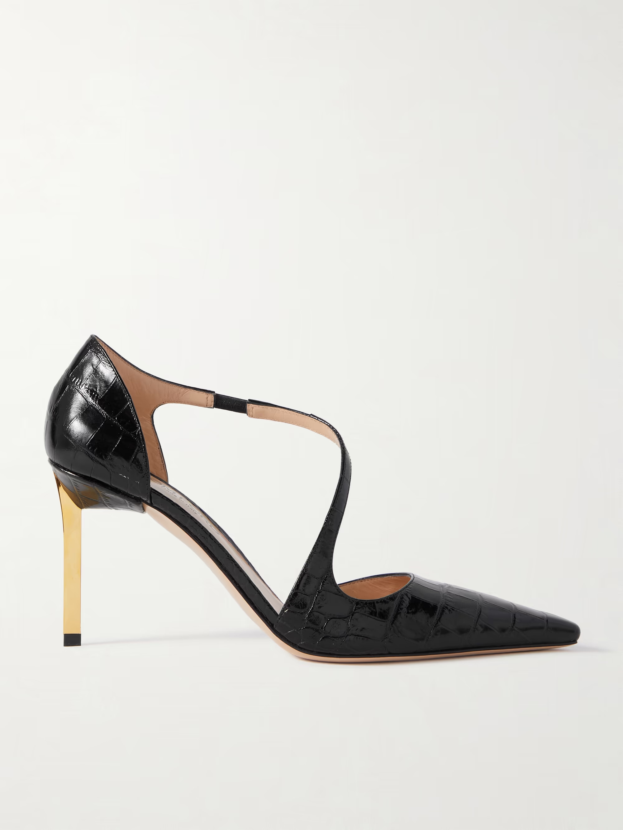 TOM FORD's 'Newton' pumps encapsulate the label's sleek and sensual elegance. Crafted in Italy fr... | NET-A-PORTER (US)