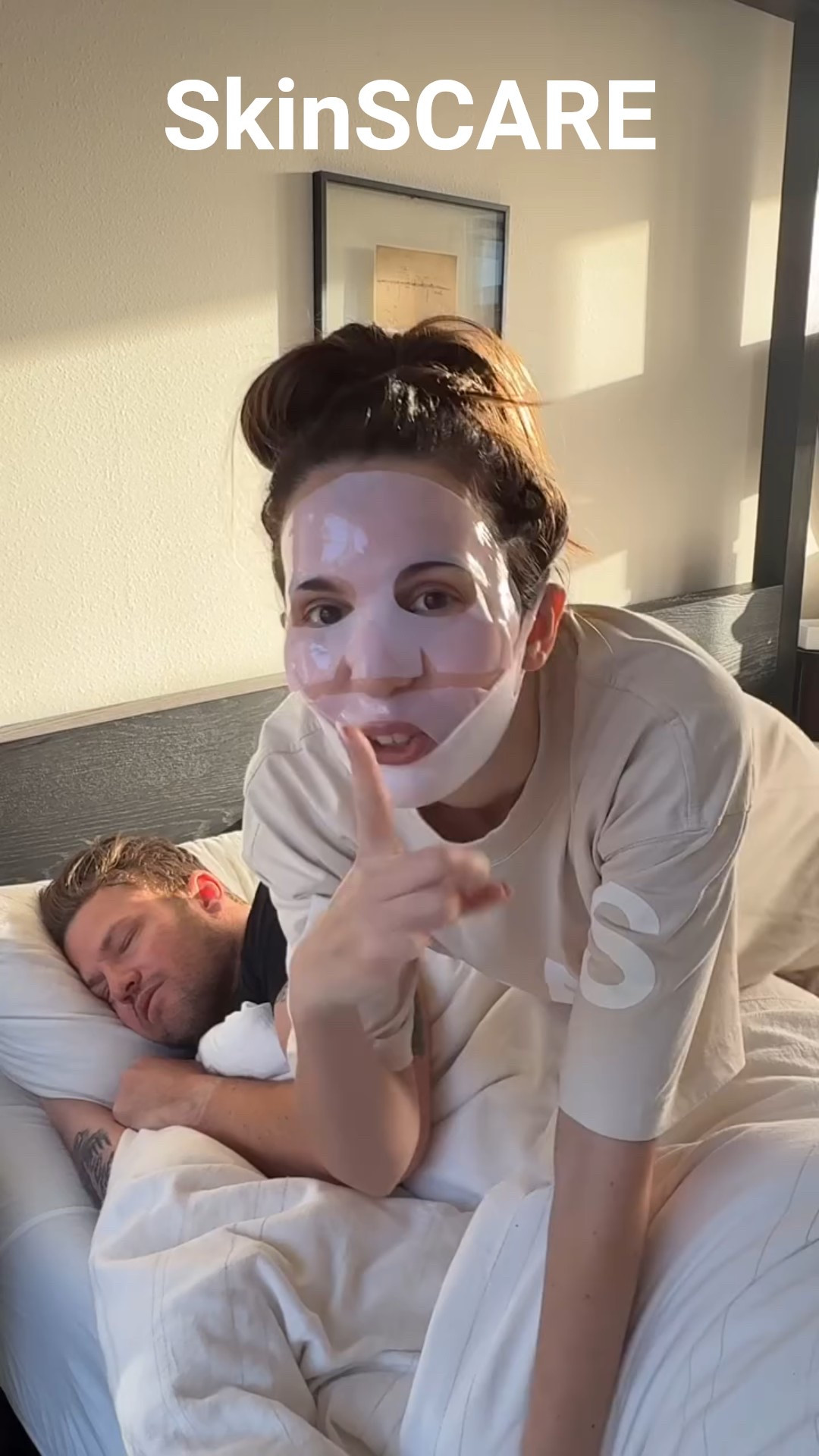 Scaring my husband awake with my favorite salmon DNA mask.