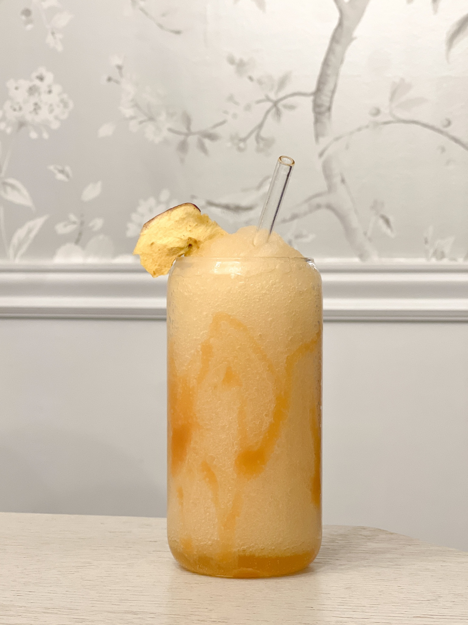 Caramel Apple Cider Slushie in a can glass with glass straw. Halloween party cocktail ideas  

#LTKparties #LTKHalloween #LTKSeasonal