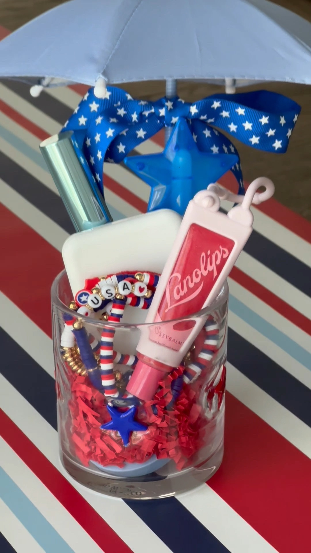 RED, WHITE & BLUE GIFT IDEA 🇺🇸
Where are all my Summer girlies?! I love this gift idea (themed of course!) And… who says you can’t grab a few things for yourself?! The phone umbrella is soooo cute and you know I love the star glass from World MarkeStar

#LTKSeasonal #LTKParties
