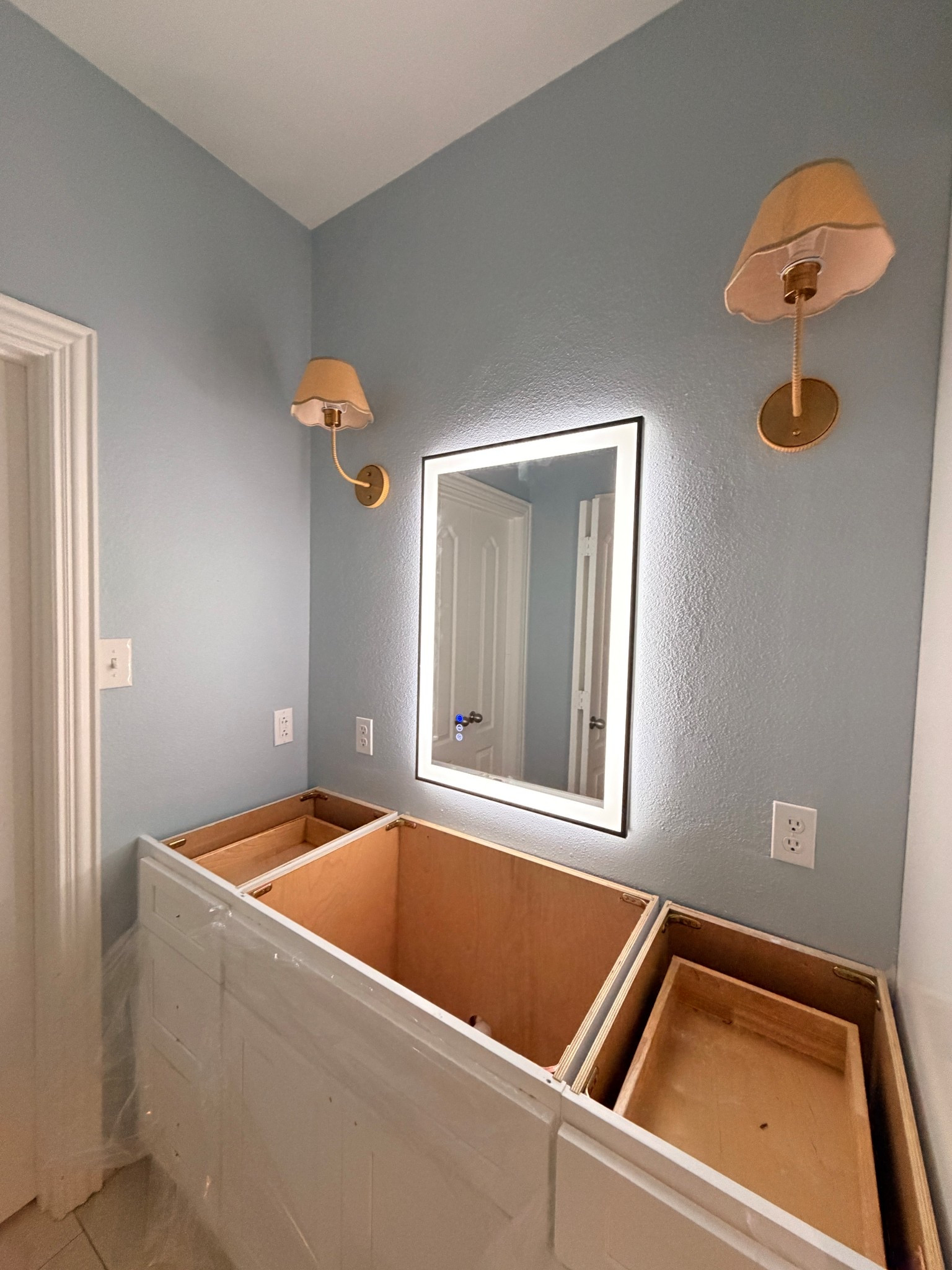 Remodeling my daughters’ bathrooms and excited about the progress thus far. Sconces and mirror from Amazon. 

#LTKHome