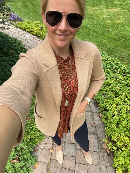 What I wore to work today - fall business casual look

Colorful brown printed sleeveless blouse with smocking. Fits future to size and on sale

Sweater blazer - sized down one
Office outfit idea for fall

Navy work pants - similar linked

Tan beige leather loafers - fit tru to size 

#LTKstyletip #LTKfindsunder100 #LTKSeasonal
