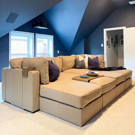 The BEST pit couch sectional for our media room! It’s so comfortable, and you can rearrange the pieces! Plus, there’s storage under the cushions! The table and cup holders make it the best place to relax in the house.



#LTKhome #LTKFind