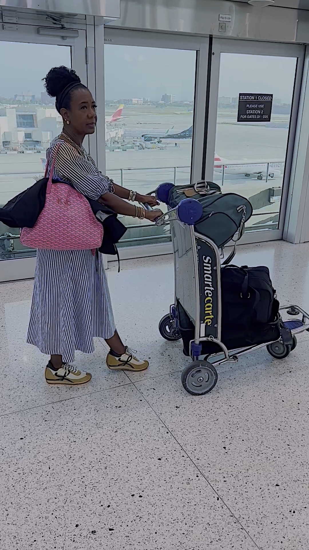 I’m all about a SmartCart!  This Loft dress from Ann Taylor was perfect for a long travel day during the dog days of Summer.

#traveloutfit
#whattoweartoflyin
#mididress

#LTKOver40 #LTKTravel #LTKVideo