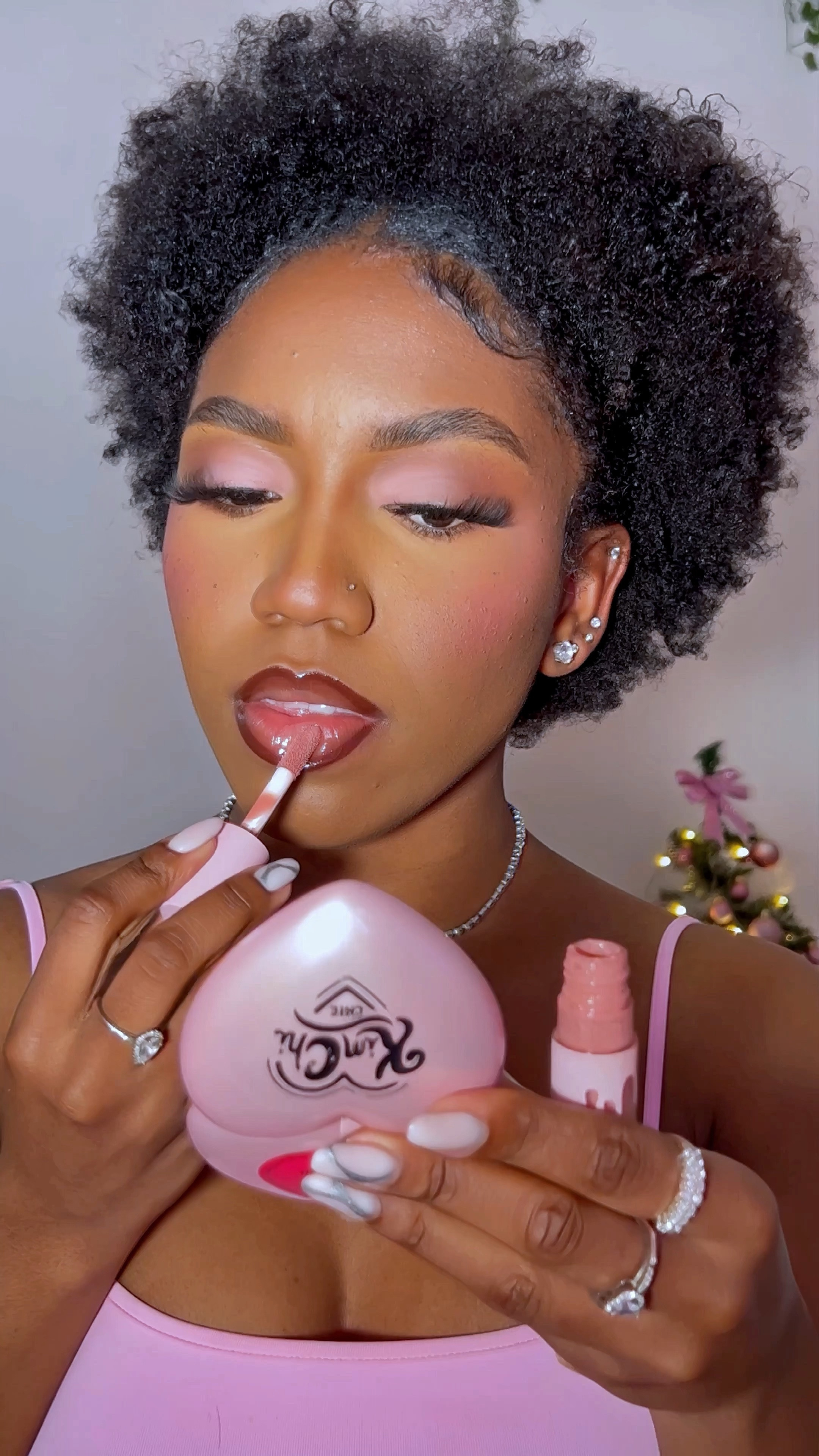 Makeup tutorial. Lip tutorial. Nude lipgloss. Fenty lipgloss. Kylie cosmetics lipgloss. Dark brown lip liner. Melanin makeup. Dark skin lip combo. 

NYX Cosmetics line loud lip pencil “rebel kind”
Fenty Beauty universal lip luminizer “hot chocolit” 
Kylie Cosmetics high gloss “koko k” 
