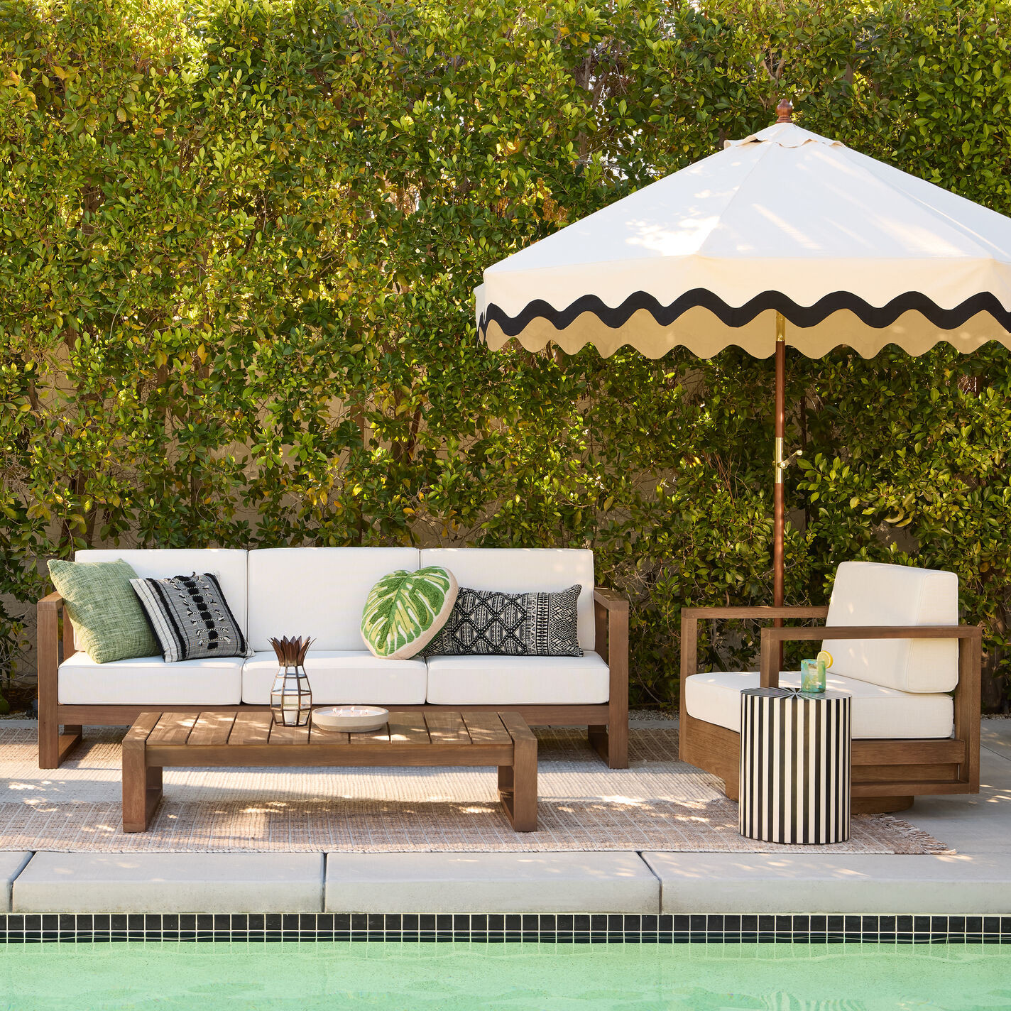 Pepino Round Black and Ivory Resin Wood Stripe Outdoor Side Table | World Market